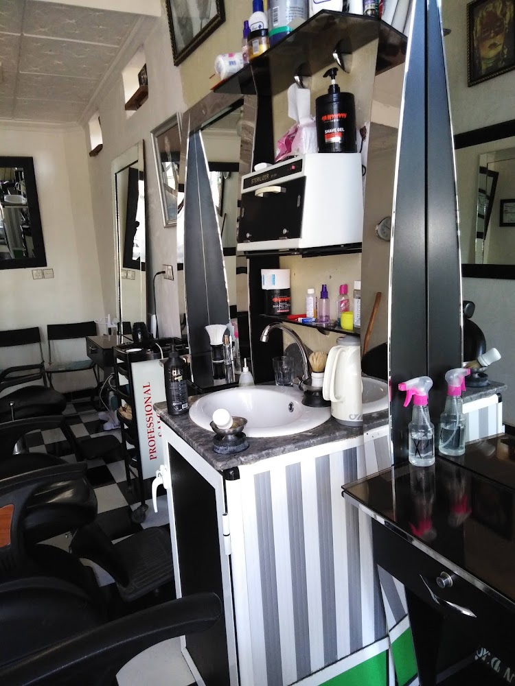 صالون حلاقة الكويطي بوغالب