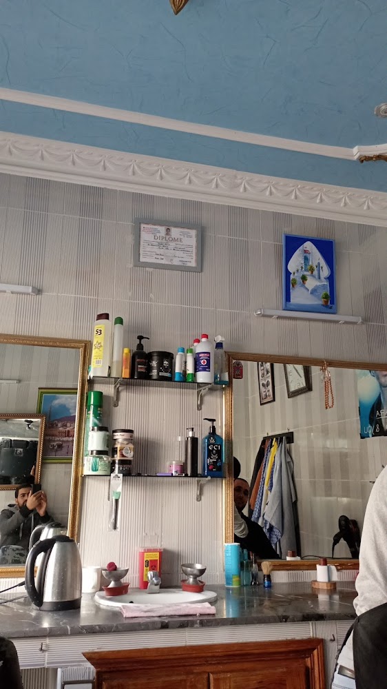 حلاق barber