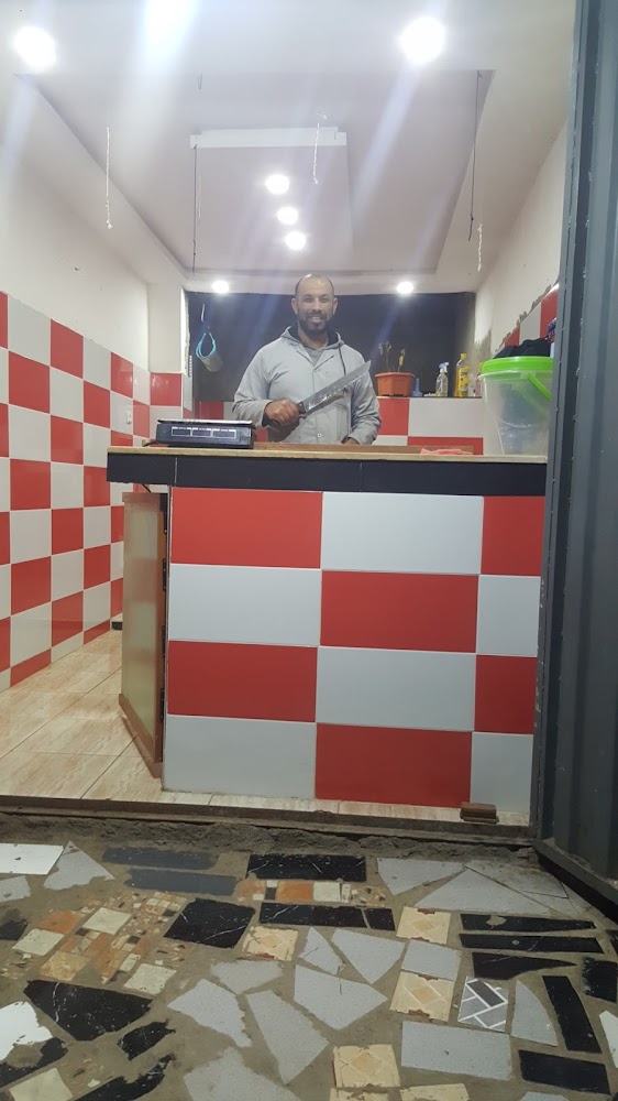 بائع الدجاج التامي
